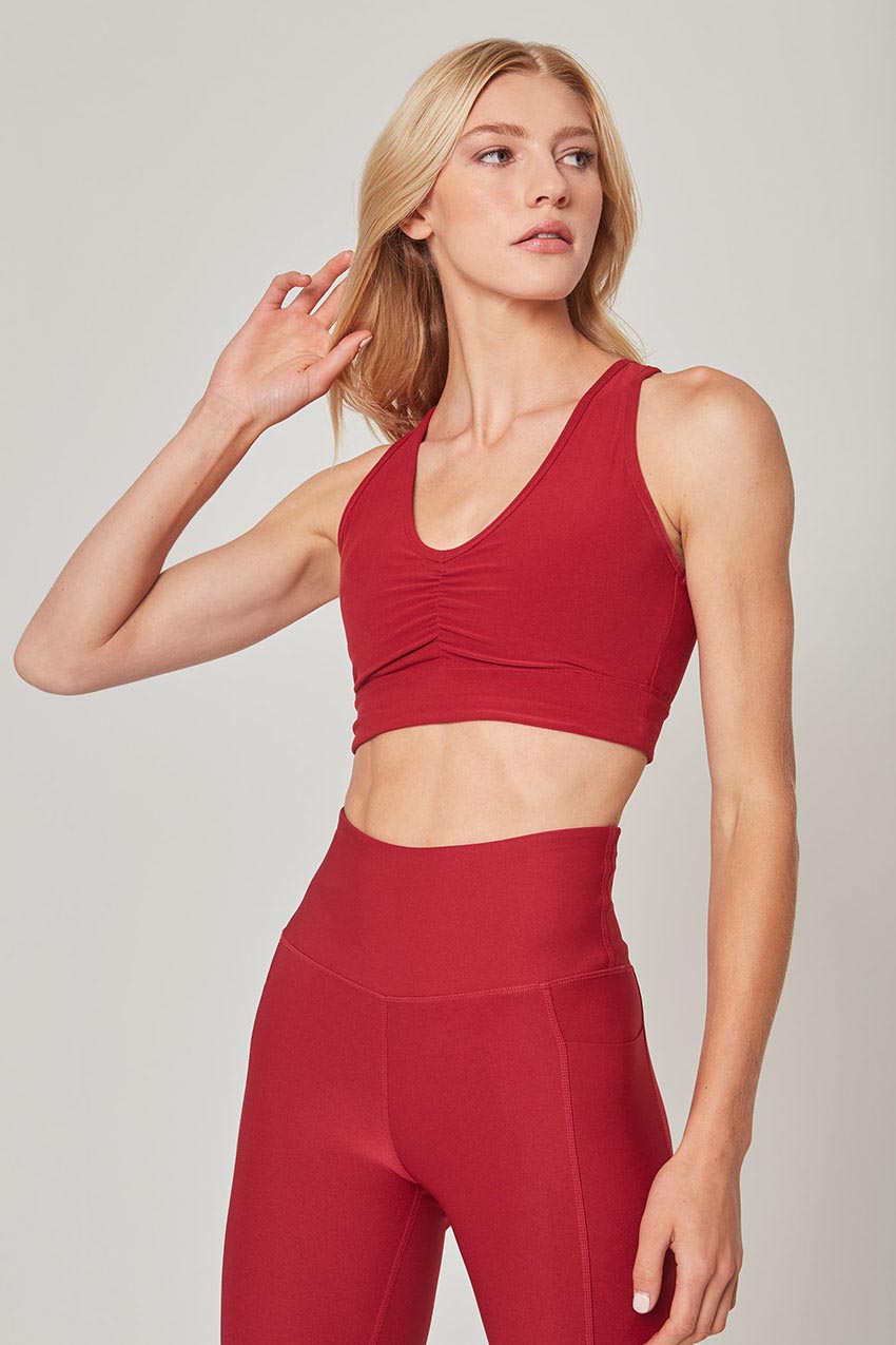 MPG Sport Explore Ruched V-Neck Medium Support Sports Bra Peached in Bordeaux