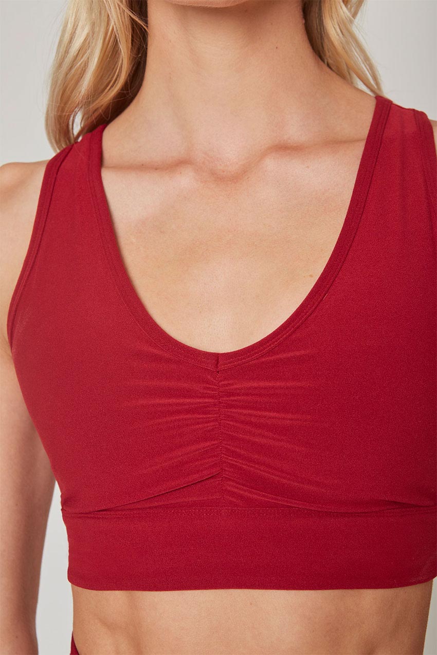 Explore Ruched V-Neck Medium Support Sports Bra Peached
