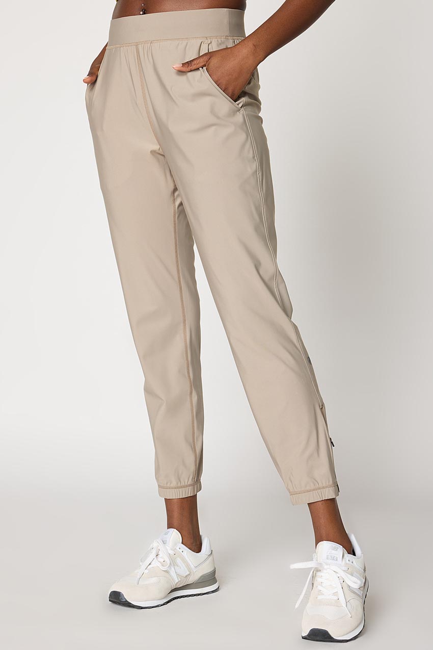 MPG Sport Adapt Back Leg Zip Jogger 27" in New Taupe