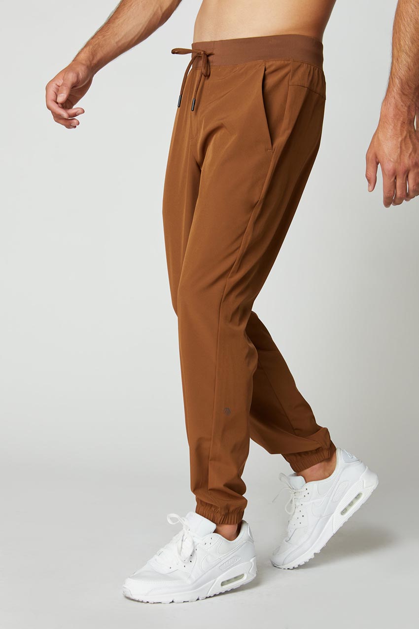 MPG Sport Lithe Recycled Polyester Stretch Woven Jogger in Caramel