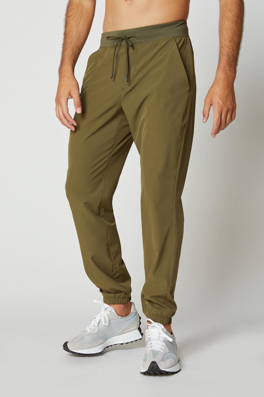 MPG Sport Lithe Recycled Polyester Stretch Woven Jogger in Safari Green