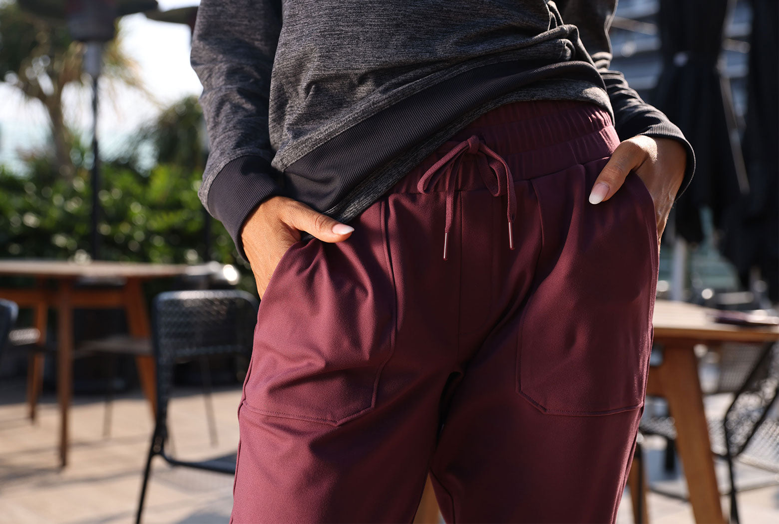 Closeup of Mondetta women's joggers in a deep red color