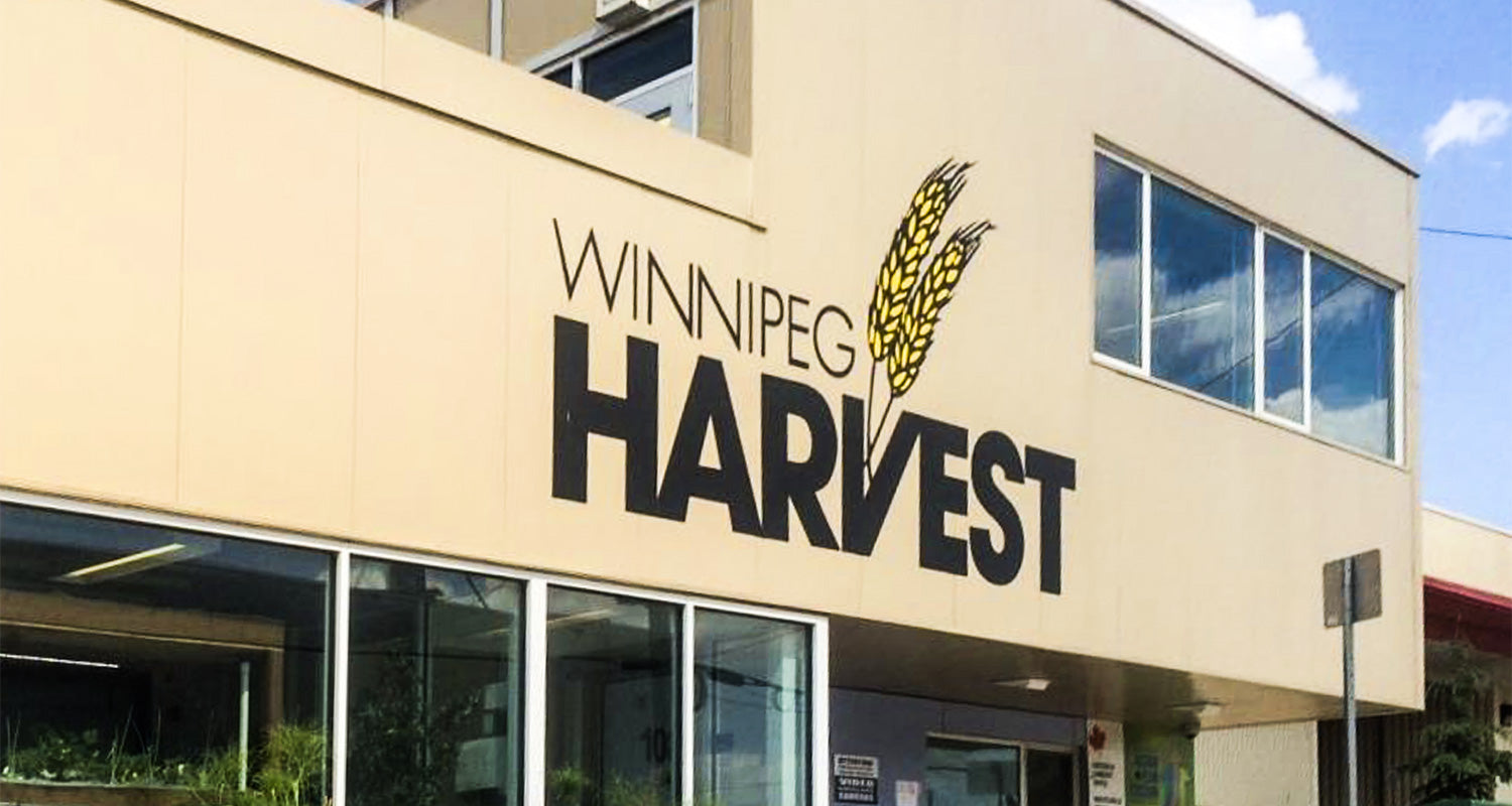 Front entrance and sign of the Winnipeg Harvest building