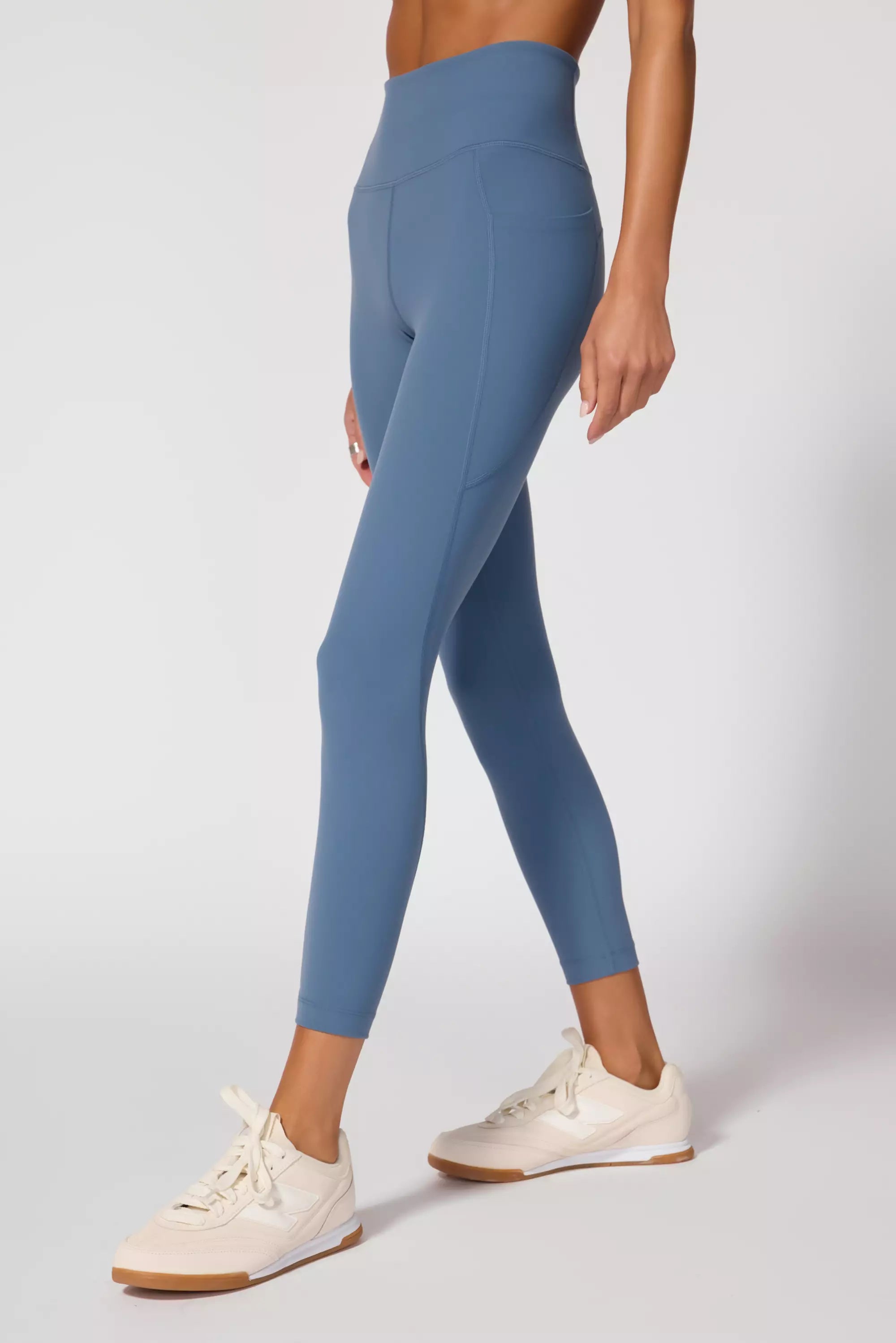 Legging de vitesse avec poche - bleu à essence